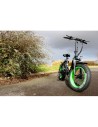 vélo électrique à gros pneus pliant noir et vert e-nomad S